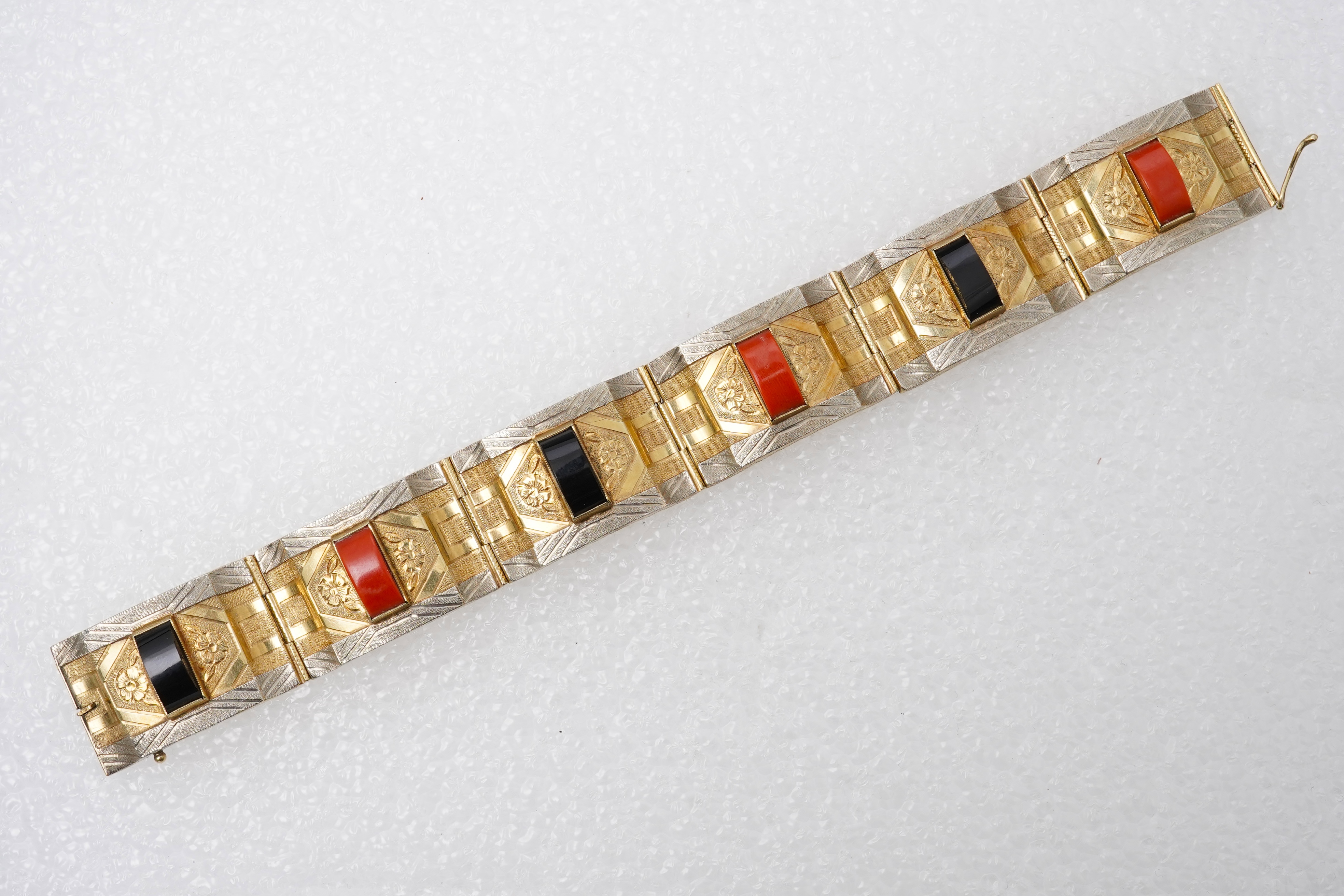 A gold, coral and onyx bracelet, Austria, mid 20th century